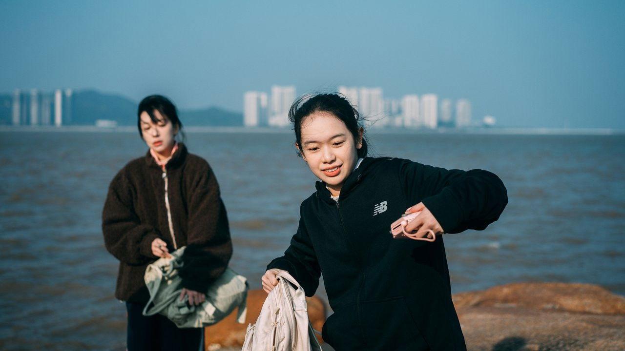 海风替我亲吻你的脸颊