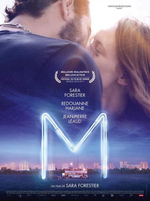 M.
